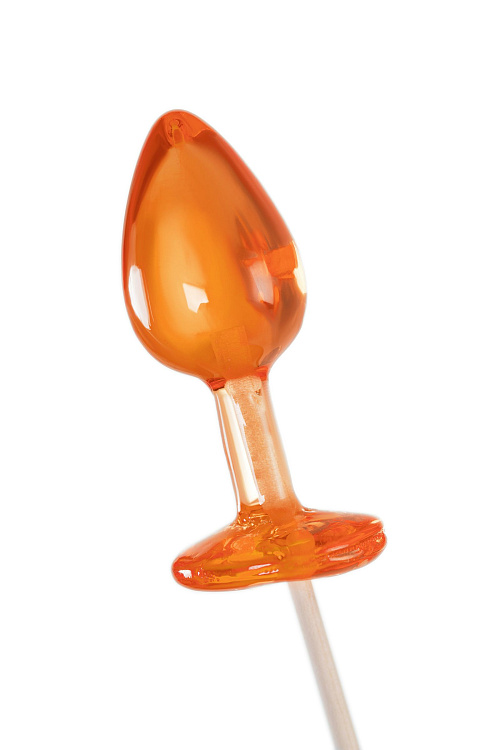 Оранжевый леденец в форме анальной пробки со вкусом амаретто - 29 гр.