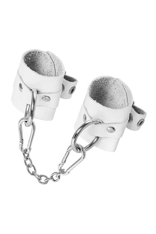 Белые мягкие кожаные наручники с люверсами